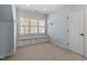 Bedroom featuring a window seat with built-in cabinets and ample natural light at 10014 Hammock Bend Bnd, Chapel Hill, NC 27517