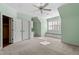 Spacious bedroom with a window bench, neutral carpet, and white trim at 10014 Hammock Bend Bnd, Chapel Hill, NC 27517