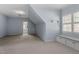 Bedroom with a window seat, neutral carpet, and access to the bathroom at 10014 Hammock Bend Bnd, Chapel Hill, NC 27517