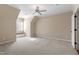 Bright bedroom with neutral walls, carpet, ceiling fan, and window seat at 10014 Hammock Bend Bnd, Chapel Hill, NC 27517