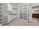 Large walk-in closet with custom built-in shelving and storage spaces at 10014 Hammock Bend Bnd, Chapel Hill, NC 27517