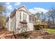 Exterior view of home with a screened porch, deck, and well-maintained landscaping at 10014 Hammock Bend Bnd, Chapel Hill, NC 27517