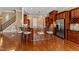 Spacious kitchen with breakfast bar, stainless steel appliances, custom cabinetry, and hardwood floors at 10014 Hammock Bend Bnd, Chapel Hill, NC 27517