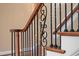 Close up of staircase featuring wood and iron railing at 10014 Hammock Bend Bnd, Chapel Hill, NC 27517