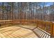 Spacious wood deck perfect for outdoor entertaining with views of the wooded backyard at 10014 Hammock Bend Bnd, Chapel Hill, NC 27517