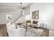 Bright living room with vaulted ceilings, an upstairs view, and stylish furnishings at 106 N Trail Dr, Raleigh, NC 27615