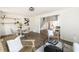 Cozy seating area next to dining area with modern decor, and abundant natural light at 106 N Trail Dr, Raleigh, NC 27615