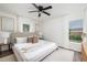 Serene bedroom with a plush bed, ample natural light, and stylish decor at 106 N Trail Dr, Raleigh, NC 27615