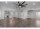 Spacious open concept living room leads to kitchen and staircase, perfect for modern living at 107 Bond St, Durham, NC 27707