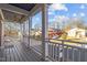 Inviting front porch with white columns and railings, perfect for relaxing outdoors at 107 Bond St, Durham, NC 27707