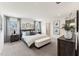 Well-lit main bedroom with a king bed, carpeted floor and coordinated decor for relaxation at 110 Cribbs Ln, Middlesex, NC 27557