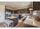 Stylish kitchen with stainless steel appliances, central island, and warm gray cabinetry at 110 Cribbs Ln, Middlesex, NC 27557