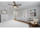 Bedroom featuring a dresser, bed, and side chair with neutral decor at 130 S Estes Dr # G3, Chapel Hill, NC 27514