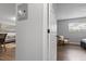 Hallway featuring light gray walls and access to bedroom and living spaces at 130 S Estes Dr # G3, Chapel Hill, NC 27514
