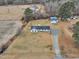 Aerial view of home, land and surrounding landscape at 140 Old Grapevine Rd, Kenly, NC 27542