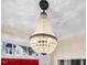 Elegant chandelier illuminating the home's entryway at 18 Wedgewood Ct, Chapel Hill, NC 27514