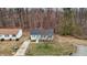 Aerial shot of the home showcasing the backyard and surrounding greenery at 200 Westbury Dr, Oxford, NC 27565