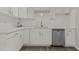 Beautiful kitchen featuring sleek white cabinets and stainless steel appliances at 200 Westbury Dr, Oxford, NC 27565