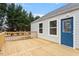 Backyard deck with wood railing and adjacent siding at 2001 Rolesville Rd, Wake Forest, NC 27587