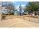 Backyard deck with shed, lawn, and gravel at 2001 Rolesville Rd, Wake Forest, NC 27587