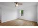 Final bedroom image with light wood floors and neutral paint at 2001 Rolesville Rd, Wake Forest, NC 27587