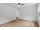 Spacious bedroom with hardwood floors and a ceiling fan at 2001 Rolesville Rd, Wake Forest, NC 27587