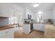 Bright kitchen features white cabinets, stainless appliances, wood countertops and stylish backsplash at 2001 Rolesville Rd, Wake Forest, NC 27587