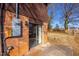Backyard patio featuring a sliding glass door leading into the house at 206 Eastway Ln, Graham, NC 27253