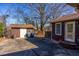 Backyard showing deck, shed, and outdoor storage space at 206 Eastway Ln, Graham, NC 27253