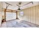 Attached garage features a white door and overhead lighting at 206 Eastway Ln, Graham, NC 27253