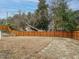 Fenced in backyard showing property line and grass at 216 Cross St, Sanford, NC 27330