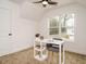 Office space with natural light, neutral color scheme, and ceiling fan at 216 Cross St, Sanford, NC 27330