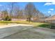 Large backyard offers ample space and includes a concrete pad at 2506 Pepperstone Dr, Graham, NC 27253
