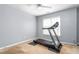 Bedroom with a treadmill; a great way to stay in shape at 2506 Pepperstone Dr, Graham, NC 27253