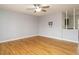 Inviting living room featuring hardwood floors, neutral walls, and a modern ceiling fan at 3700 Dinkens Dr, Sanford, NC 27332