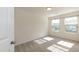 Bedroom with carpet, two windows that let in natural light, and neutral walls at 3836 Prince Noah Loop, Wake Forest, NC 27587