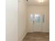 Bright entryway features a glass front door and wood-look floors at 3836 Prince Noah Loop, Wake Forest, NC 27587