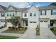 Charming townhome with well-maintained landscaping and attached garage at 3836 Prince Noah Loop, Wake Forest, NC 27587