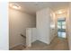 Upstairs hallway with white trim and carpeted floors at 3836 Prince Noah Loop, Wake Forest, NC 27587
