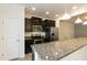 Modern kitchen featuring granite counters, stainless appliances and breakfast bar at 3836 Prince Noah Loop, Wake Forest, NC 27587