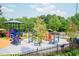 The community playground features a colorful play structure with slides and a swing set at 3836 Prince Noah Loop, Wake Forest, NC 27587