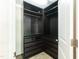 Modern walk-in closet with shelving and drawers for optimal organization and storage at 3836 Prince Noah Loop, Wake Forest, NC 27587