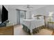 This inviting bedroom features a ceiling fan and window, providing a tranquil ambiance at 3929 Browning Pl, Raleigh, NC 27609