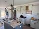 Spacious kitchen being updated with white cabinets and modern lighting fixtures. Interior renovation at 3943 Baileys Xrds Rd, Benson, NC 27504