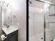 Bathroom featuring a sink, vanity, and shower with sliding glass doors at 3958 Buckhorn Rd, Sanford, NC 27330