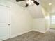 This carpeted bedroom features a modern ceiling fan and natural light from the window at 3958 Buckhorn Rd, Sanford, NC 27330