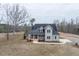Charming home with solar panels, covered porch, and a well-manicured lawn at 3958 Buckhorn Rd, Sanford, NC 27330
