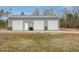 A detached three-car garage with ample storage and parking space is visible in this image at 3958 Buckhorn Rd, Sanford, NC 27330