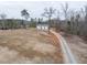 Detached two-car garage with an extra lean-to and long driveway at 3958 Buckhorn Rd, Sanford, NC 27330