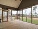 This lovely screened porch features views of the backyard at 3958 Buckhorn Rd, Sanford, NC 27330